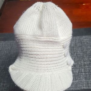 Women's Stylish winter cap with buttons and a bill